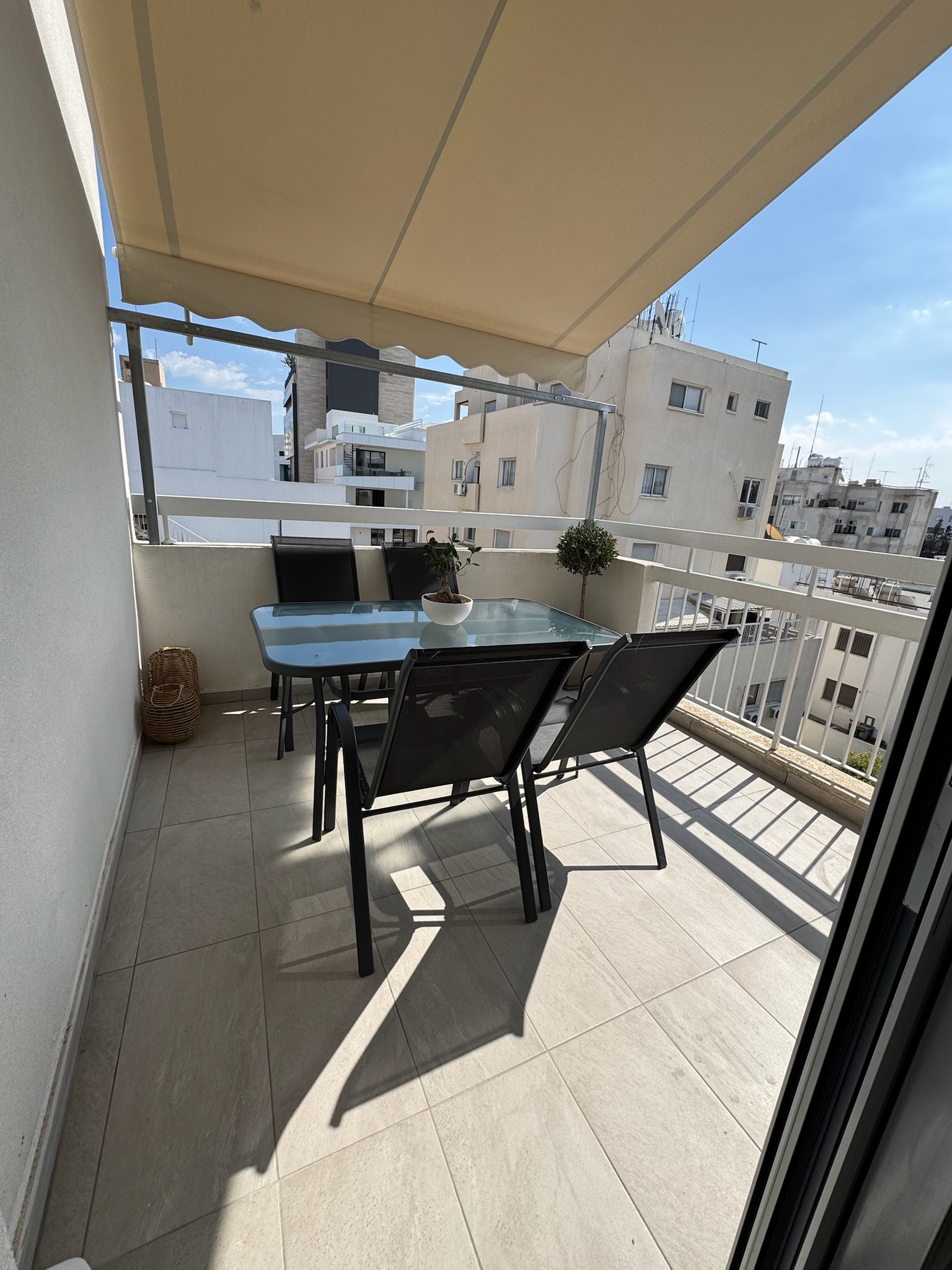 Private veranda with outdoor table and chairs